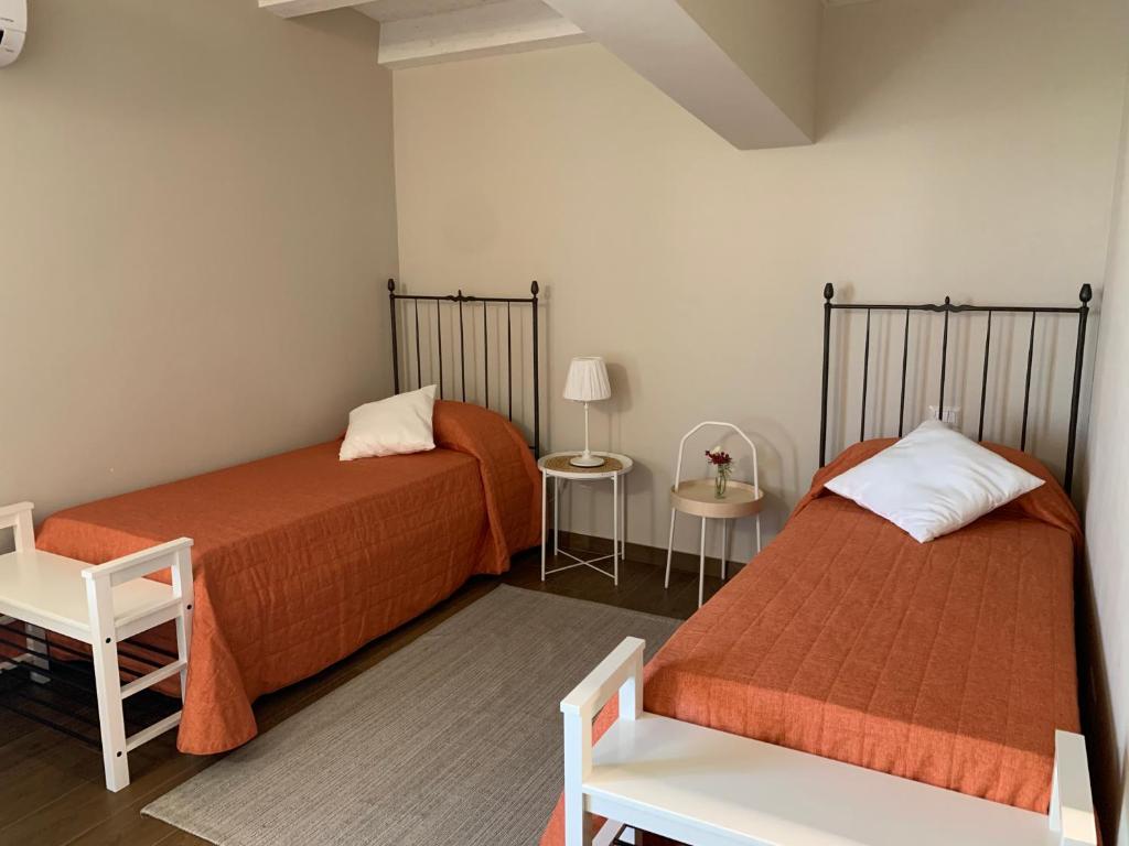 Postel nebo postele na pokoji v ubytování Borgo Nocchiara