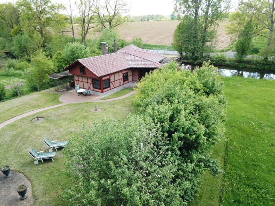 an aerial view of a house in a yard at Chalet am See in Sontra