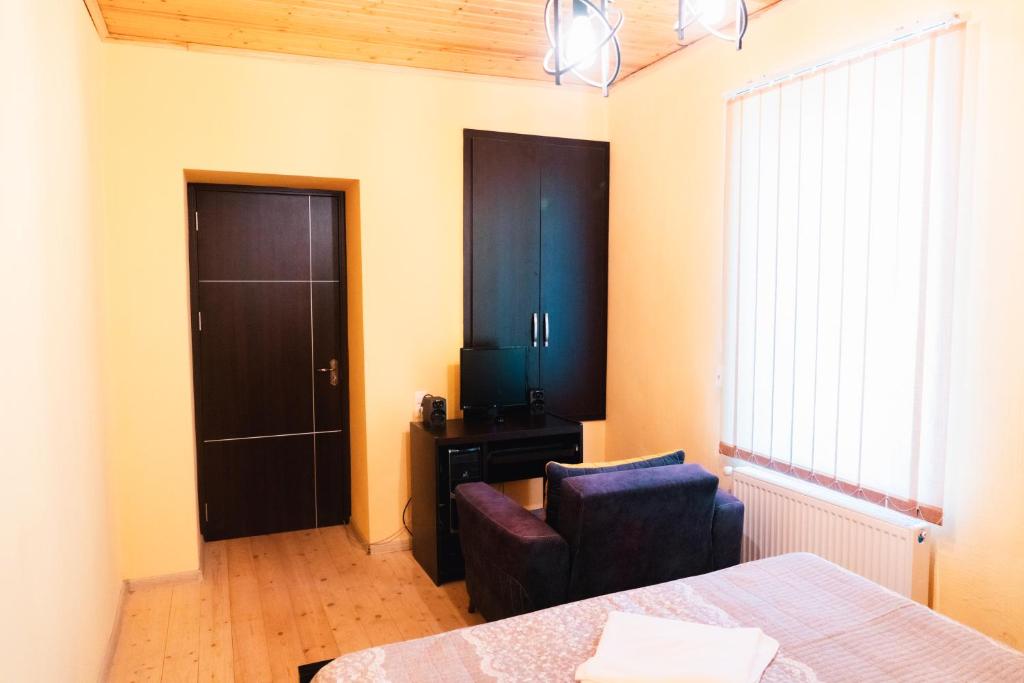Postel nebo postele na pokoji v ubytování My Home in Tsinandali