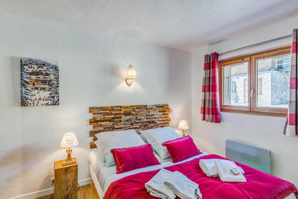Posteľ alebo postele v izbe v ubytovaní Appartement Alpage - Welkeys