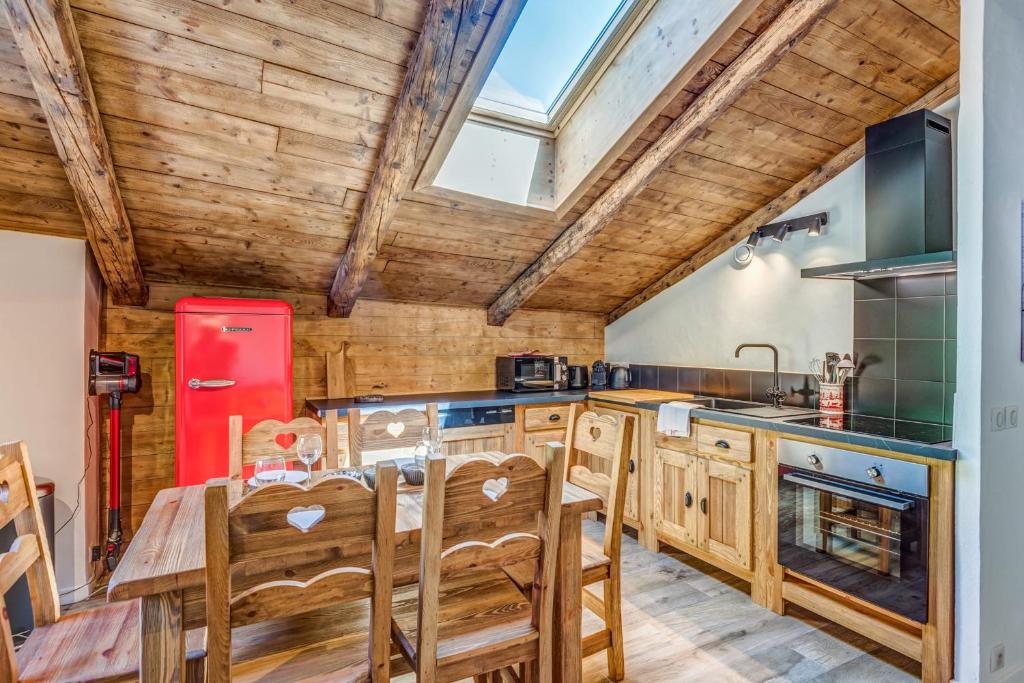 Kuchyňa alebo kuchynka v ubytovaní Appartement Alpage - Welkeys