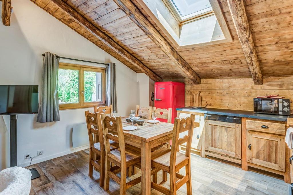 Kuchyňa alebo kuchynka v ubytovaní Appartement Alpage - Welkeys