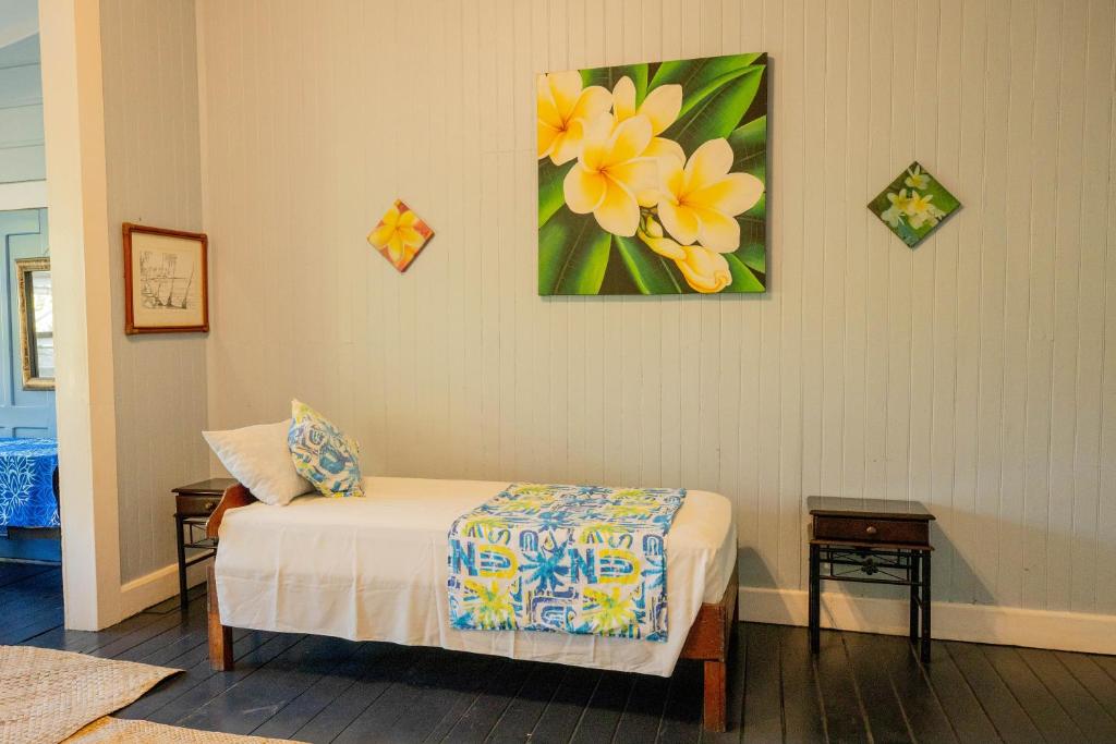 Postel nebo postele na pokoji v ubytování The Samoan Outrigger Hotel