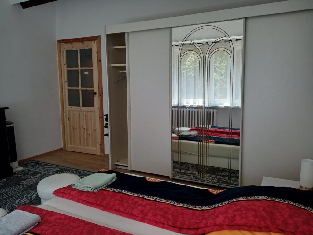 Postel nebo postele na pokoji v ubytování ROMANOWKA