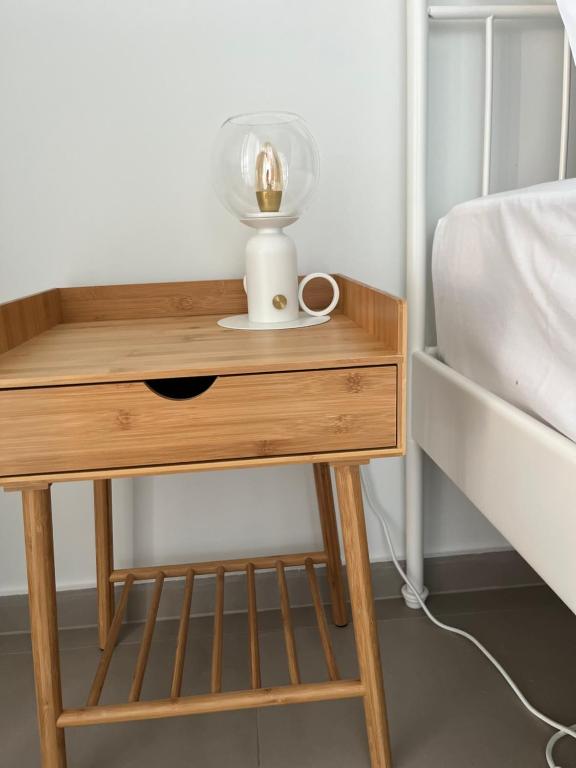 Posteľ alebo postele v izbe v ubytovaní Fofi's City Center Apartment