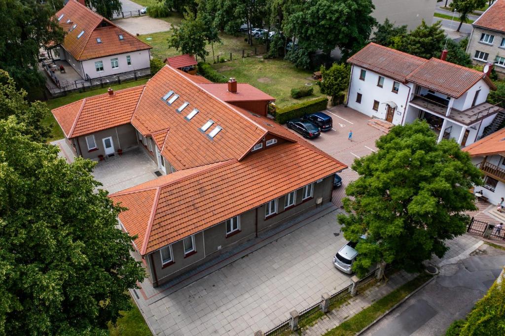an overhead view of a house with an orange roof at Apartamentai Klaipeda Inn in Klaipėda