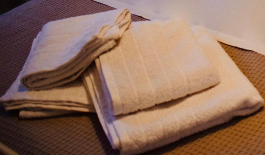 Posteľ alebo postele v izbe v ubytovaní Katovigli Seaview Apartment