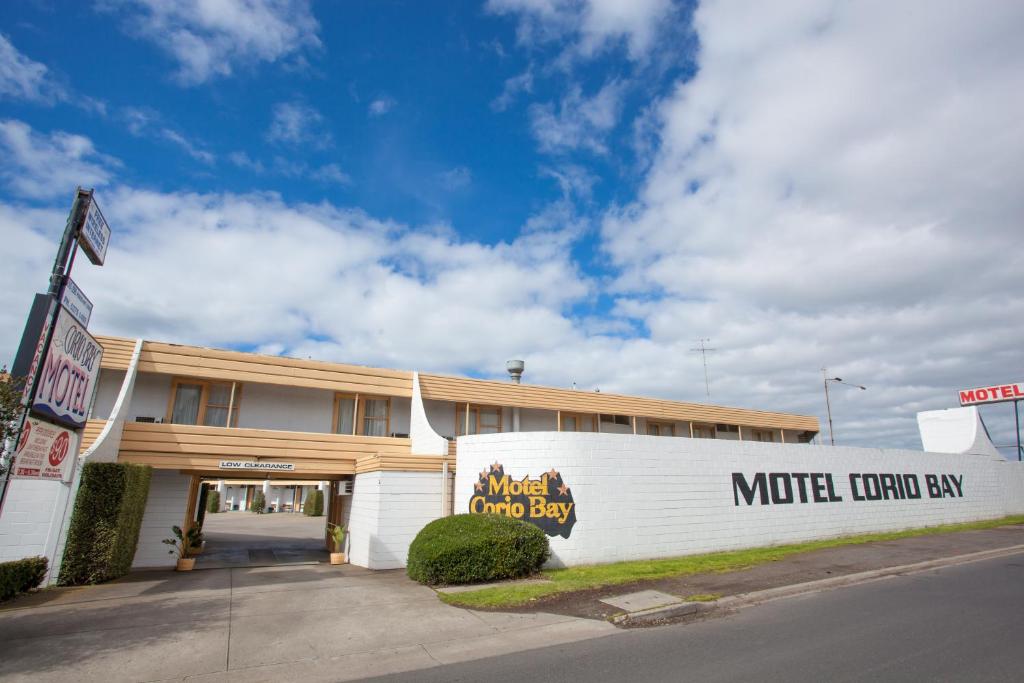 a building with a sign that reads what a trump hotel bay at Corio Bay Motel in Corio