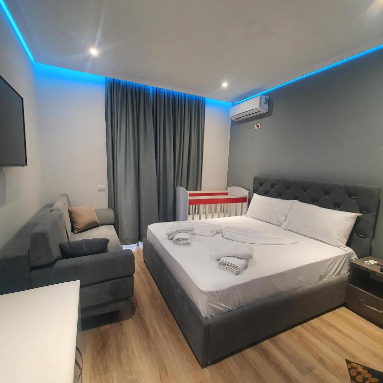Postel nebo postele na pokoji v ubytování Villa Mehmeti