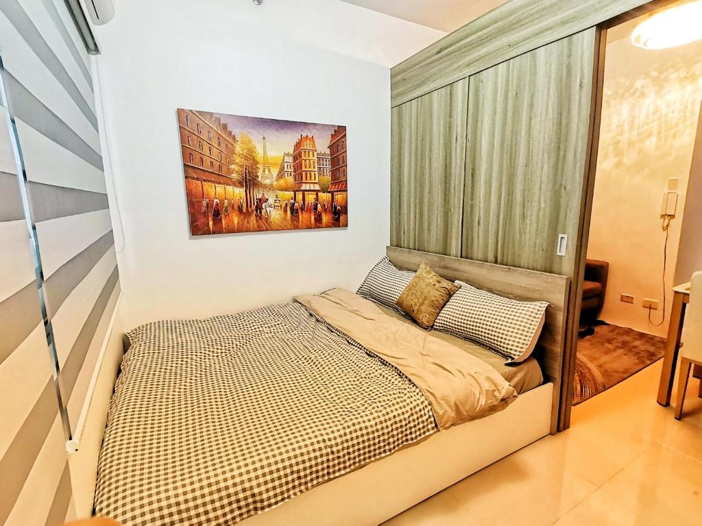 Stylish 1 Bedroom Condo Unit with Perfect Pool View Balcony at Fame