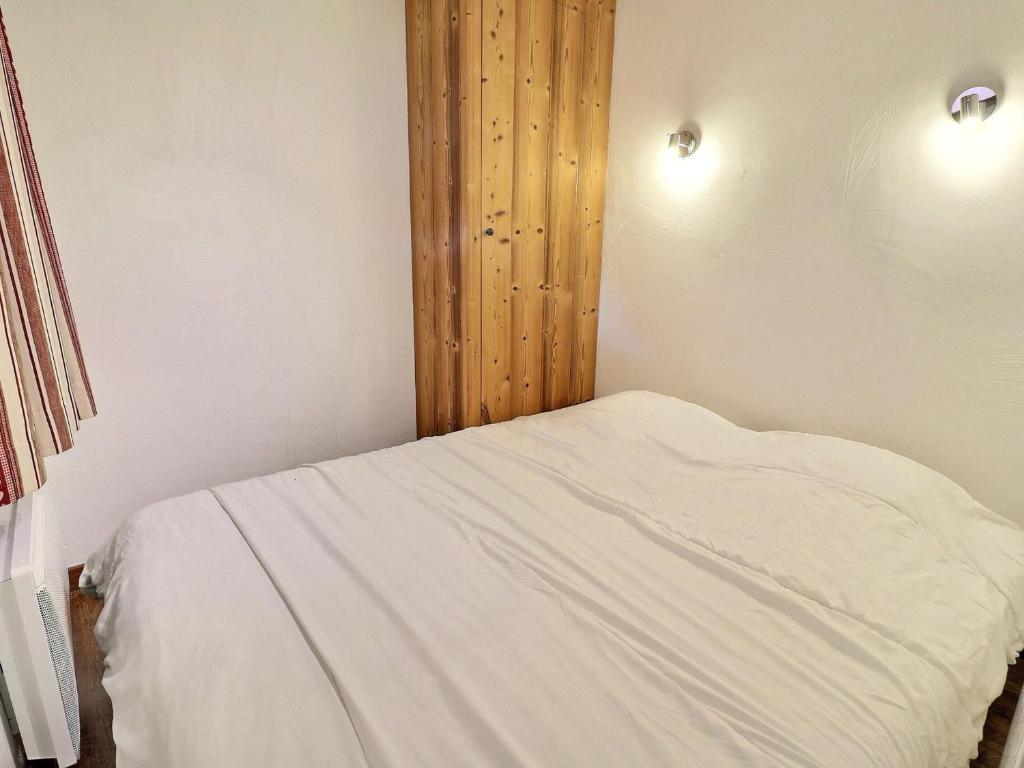 Posteľ alebo postele v izbe v ubytovaní Appartement à La Tania, 25m², 4 pers, skis aux pieds, proche centre et remontées mécaniques - FR-1-182A-16