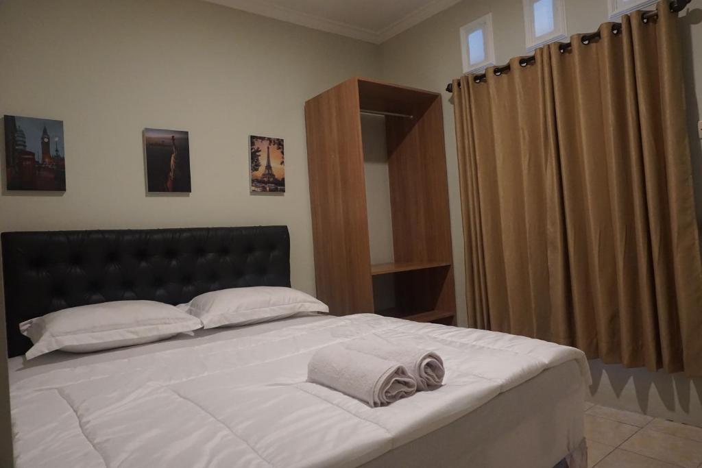 Postel nebo postele na pokoji v ubytování Alexandria12 Guest House