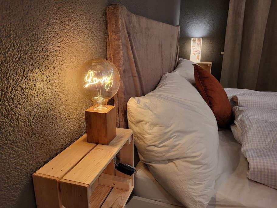 Postel nebo postele na pokoji v ubytování Ski-in cosy studio