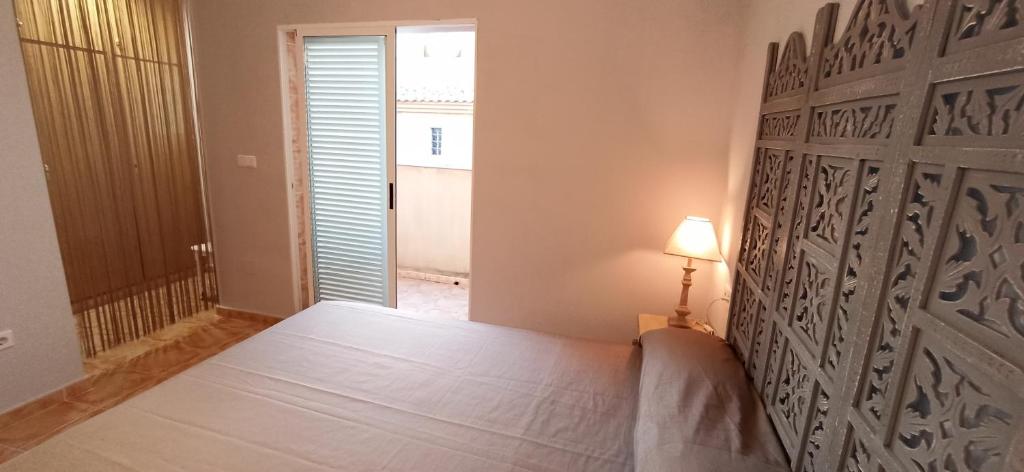 Postel nebo postele na pokoji v ubytování BUNGALOW CON ENCANTO, MONTE DE MAR