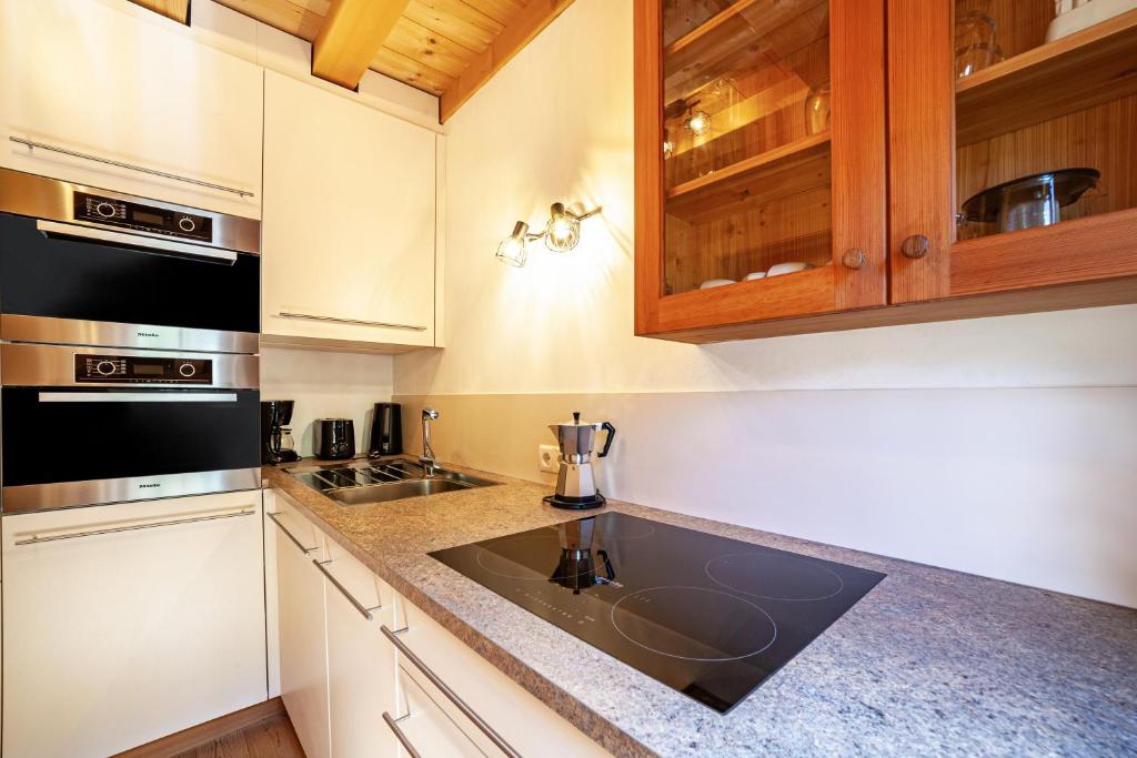 Kuchyň nebo kuchyňský kout v ubytování Bergchalet Refugium Martius