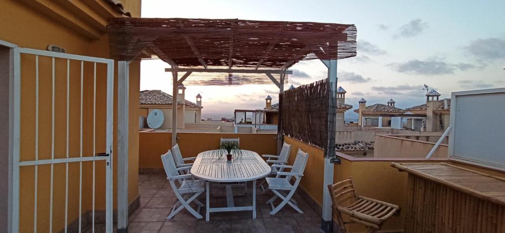 Balkón nebo terasa v ubytování BUNGALOW CON ENCANTO, MONTE DE MAR