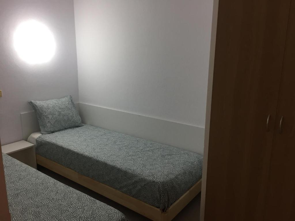 Postel nebo postele na pokoji v ubytování Apartamento céntrico con 2 habitaciones y Wi-Fi