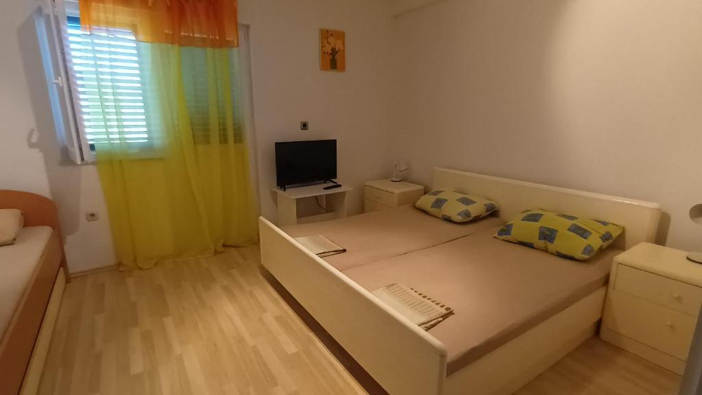 TV a/nebo společenská místnost v ubytování Marijan Martinović Apartments