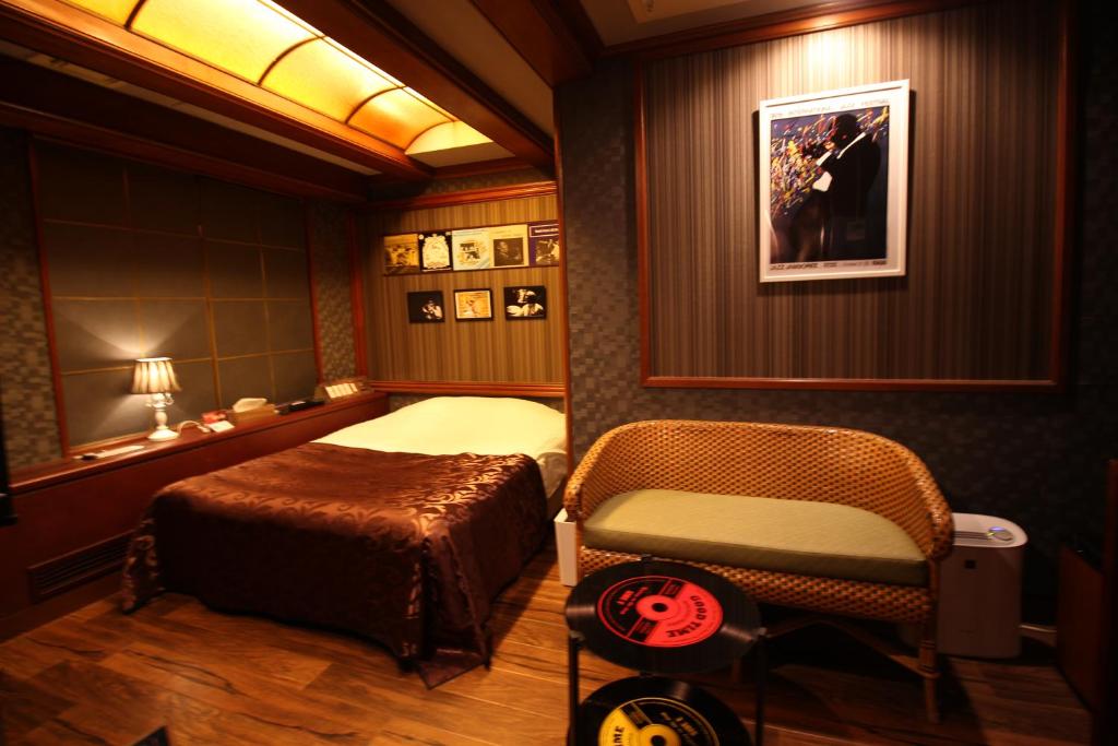 Postel nebo postele na pokoji v ubytování Hotel OLDSWING Adult Only