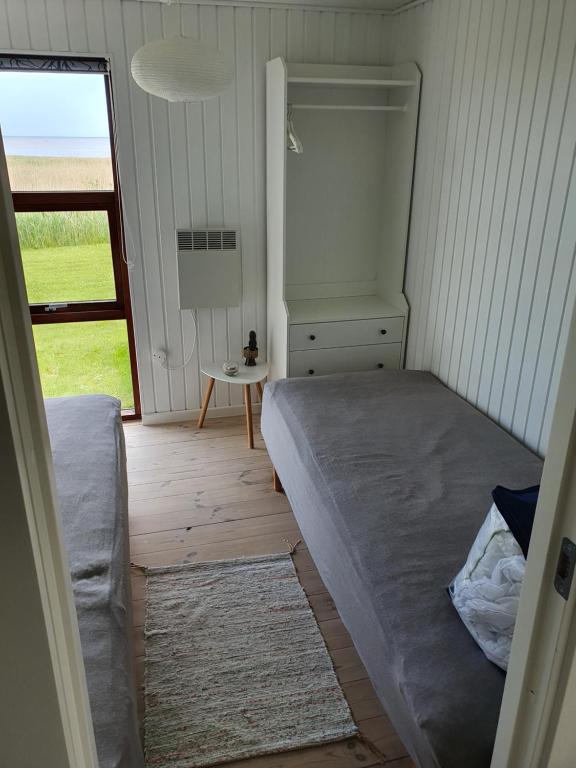 Postel nebo postele na pokoji v ubytování Full Ocean View & Game Rooms
