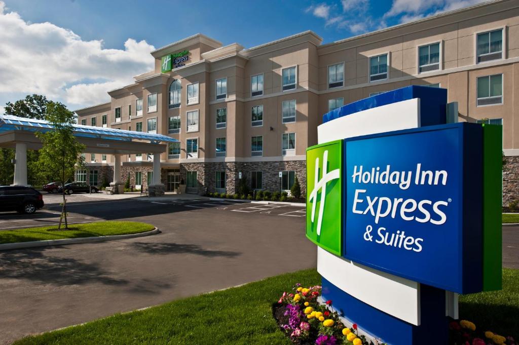 uma representação de um Hilton Inn Express e um edifício de suites em Holiday Inn Express & Suites Columbus - Easton Area, an IHG Hotel em Gahanna