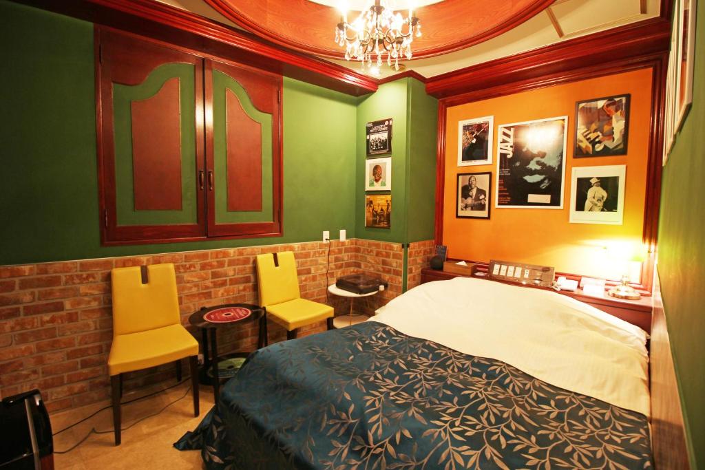 Postel nebo postele na pokoji v ubytování Hotel OLDSWING Adult Only