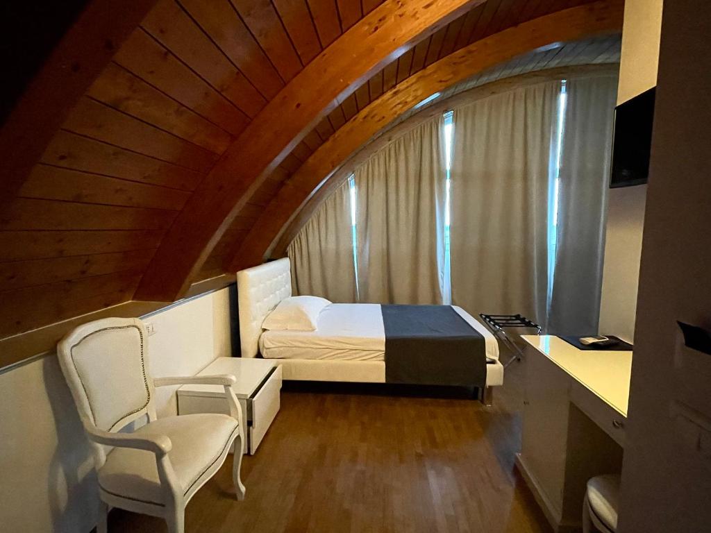 Postel nebo postele na pokoji v ubytování Hotel Noventa