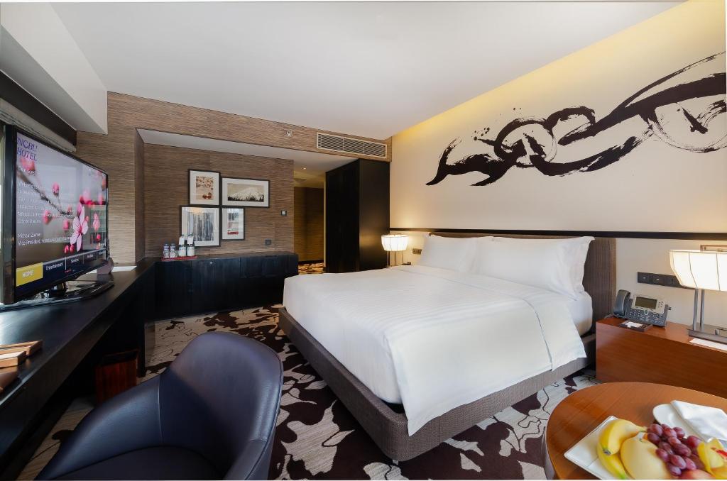 TV a/nebo společenská místnost v ubytování City of Dreams - Nobu Hotel Manila