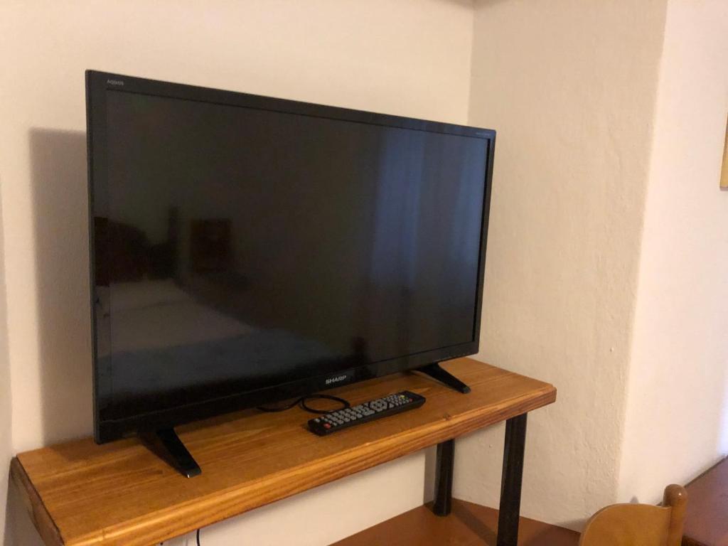 A television and/or entertainment centre at Case vacanze Desiree