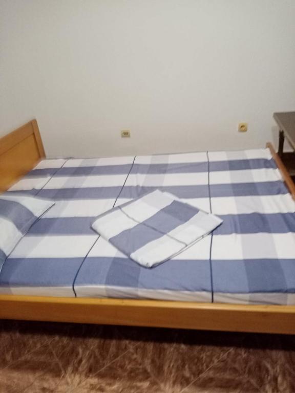 Postel nebo postele na pokoji v ubytování Apartments Mušović