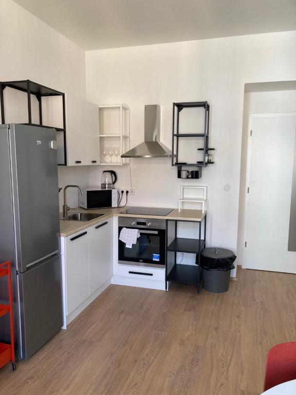 Kuchnia lub aneks kuchenny w obiekcie Žižkov tower suites