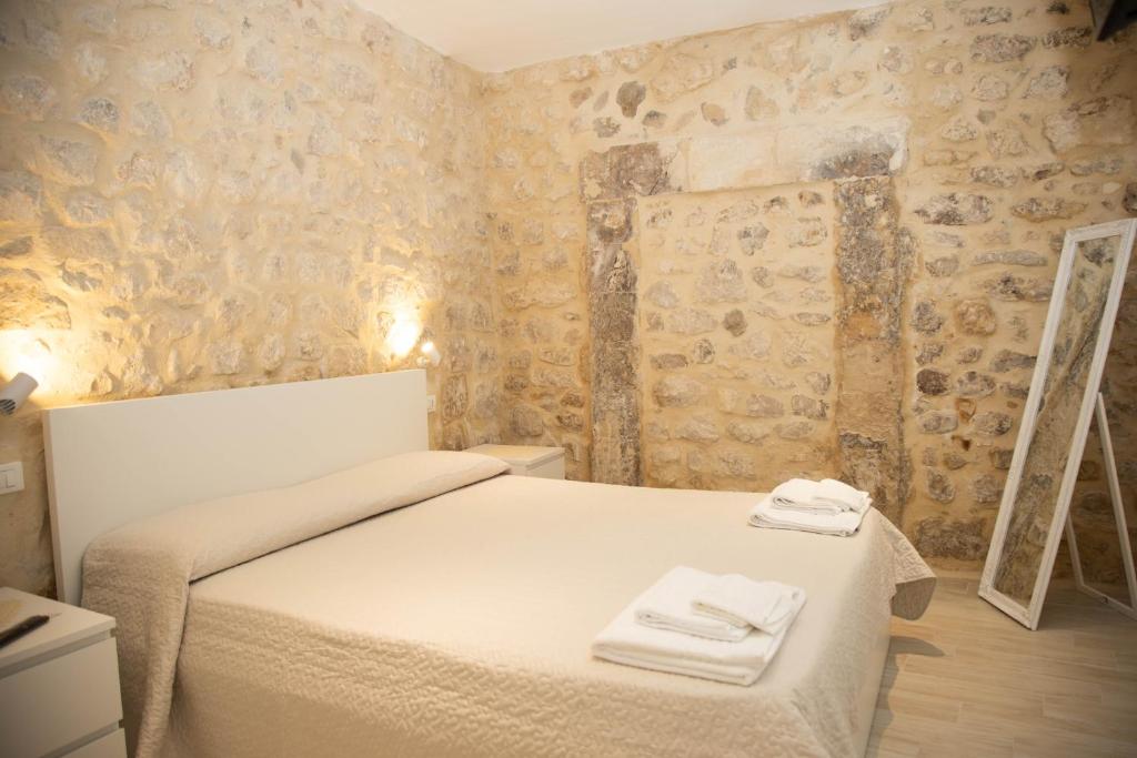 Posteľ alebo postele v izbe v ubytovaní Casa di Gio