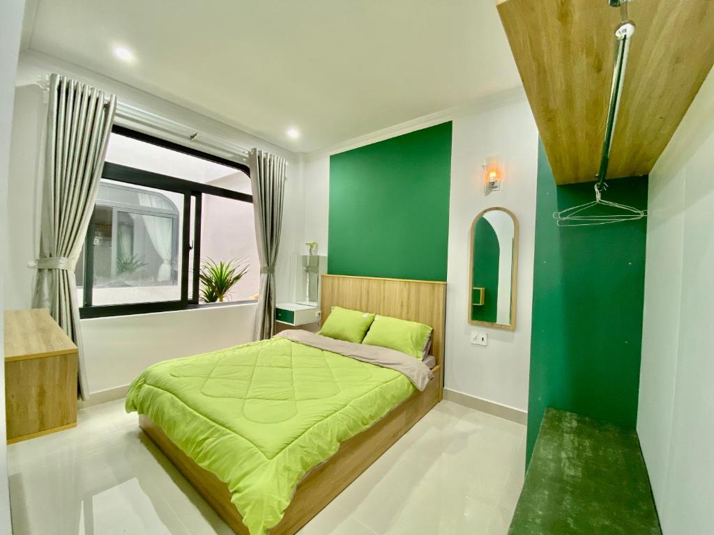 Giường trong phòng chung tại SÂM LÂM HOUSE - Bảo Lộc