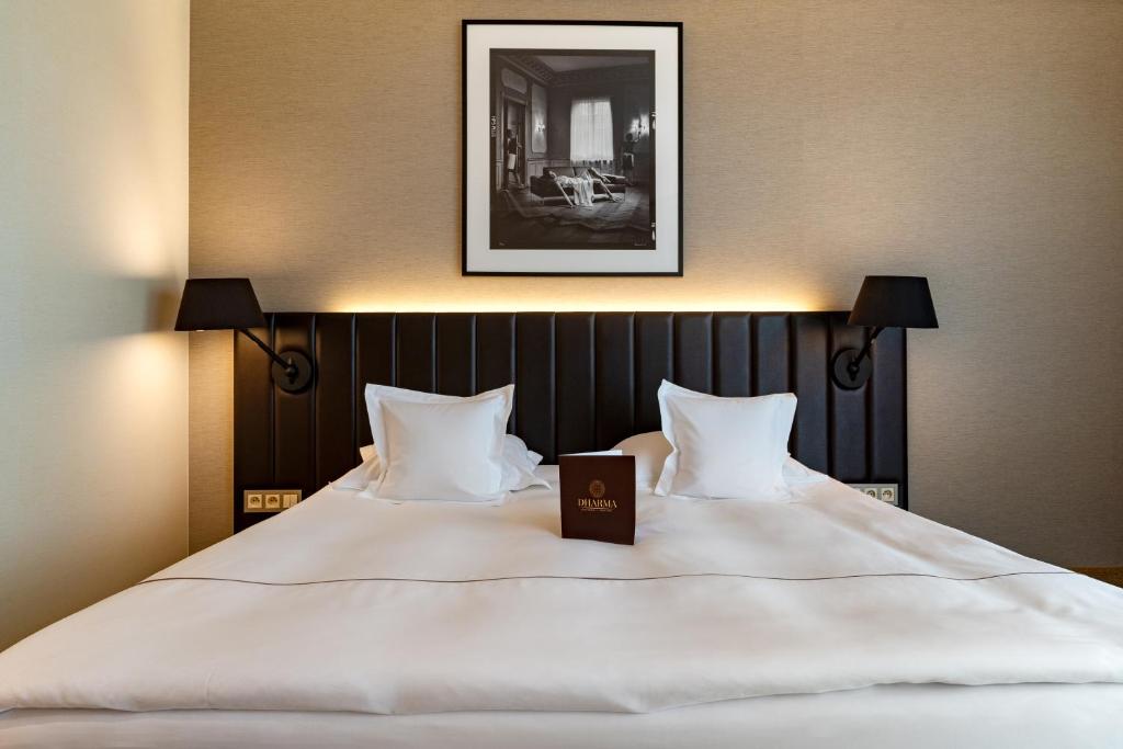 Posteľ alebo postele v izbe v ubytovaní Tiffi Boutique Hotel