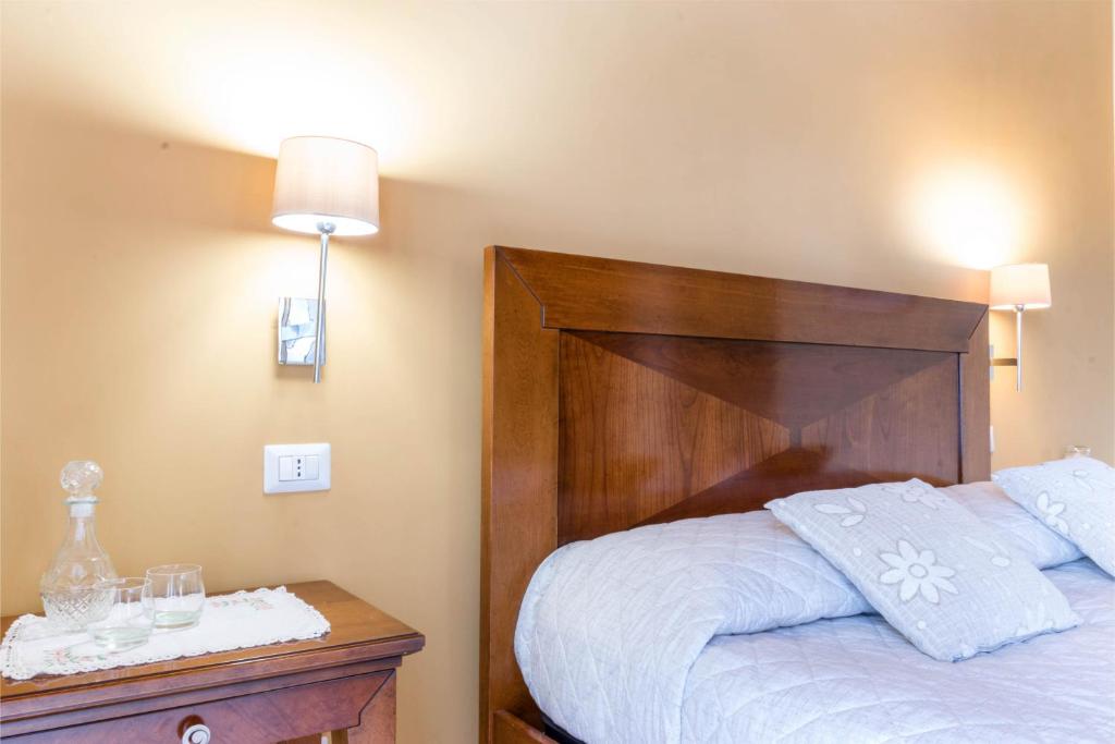 Postel nebo postele na pokoji v ubytování Agriturismo Terrerosse Di Massadita