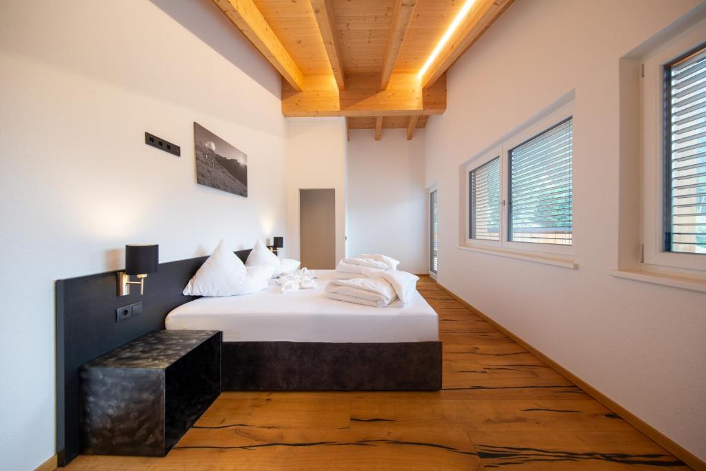 A bed or beds in a room at A CASA Onyx