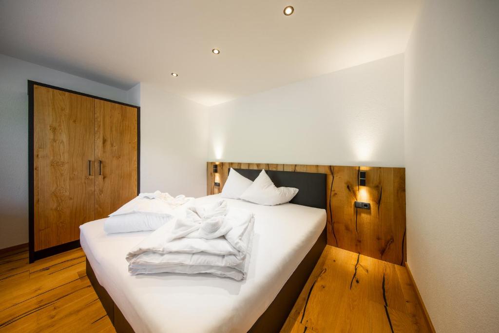 A bed or beds in a room at A CASA Onyx