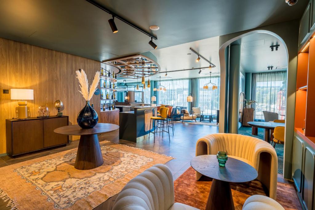 Posezení v ubytování Hotel D Bulle - La Gruyère