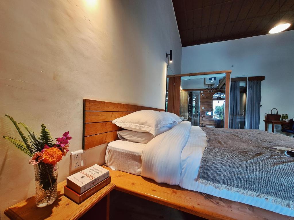 Postel nebo postele na pokoji v ubytování Deodar Homestay