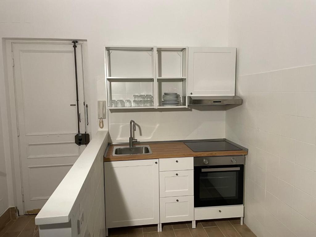 Kuchyň nebo kuchyňský kout v ubytování Art Atelier Apartments