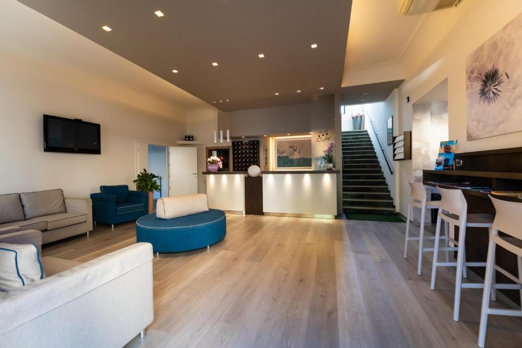 TV a/nebo společenská místnost v ubytování Hotel Dafne