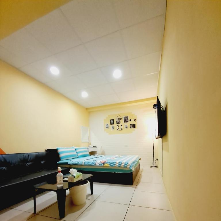 TV a/nebo společenská místnost v ubytování Ming House