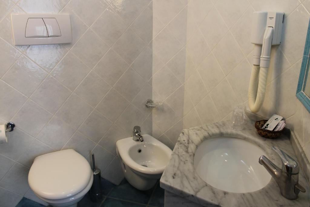 Koupelna v ubytování Hotel Esperia