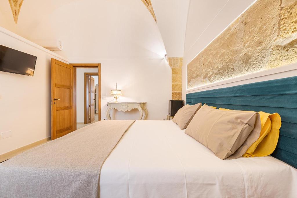 Postel nebo postele na pokoji v ubytování Le Mule Suite and Rooms - Specchia