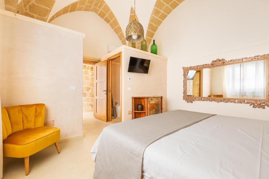 Postel nebo postele na pokoji v ubytování Le Mule Suite and Rooms - Specchia