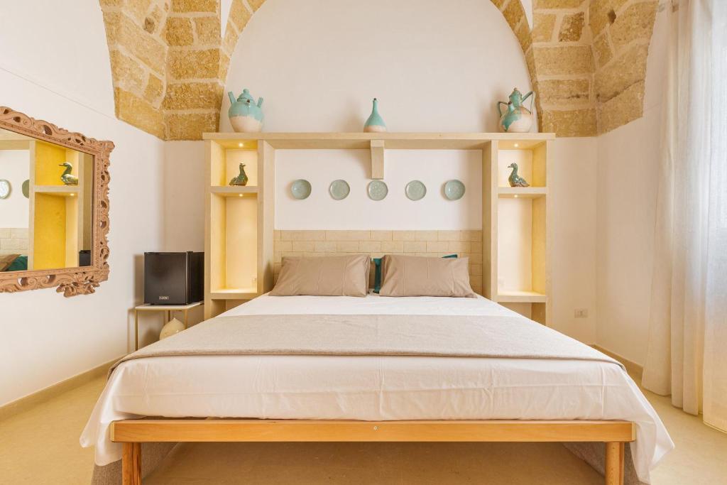 Postel nebo postele na pokoji v ubytování Le Mule Suite and Rooms - Specchia
