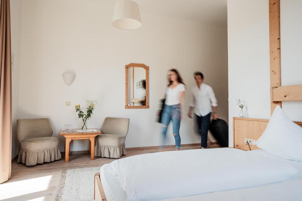 Postel nebo postele na pokoji v ubytování Hotel Vötterl
