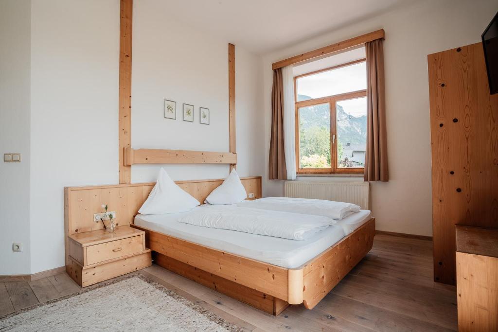 Postel nebo postele na pokoji v ubytování Hotel Vötterl