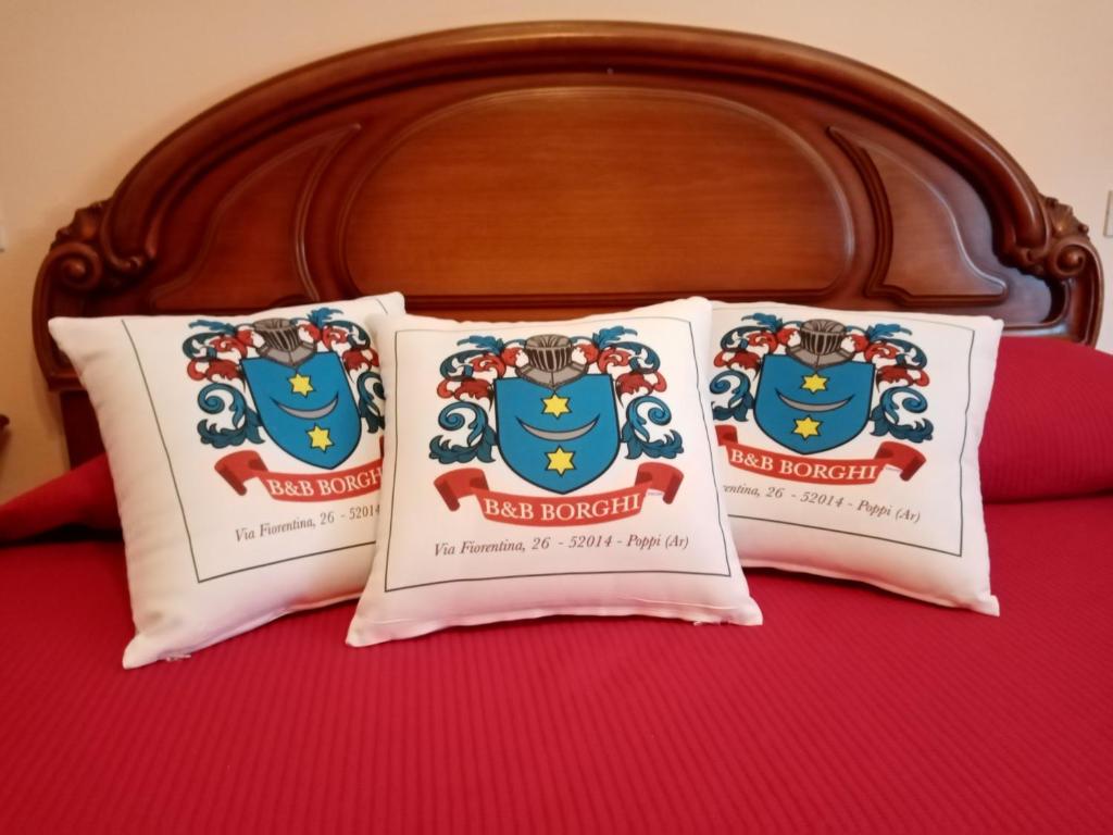 Postel nebo postele na pokoji v ubytování B&B BORGHI