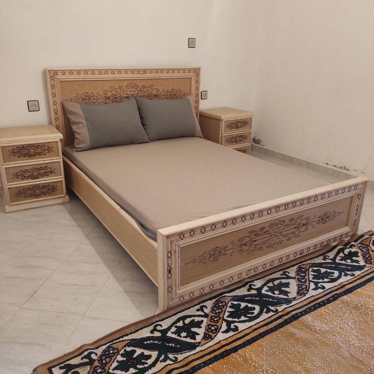 Cama o camas de una habitación en Appartement Berkane